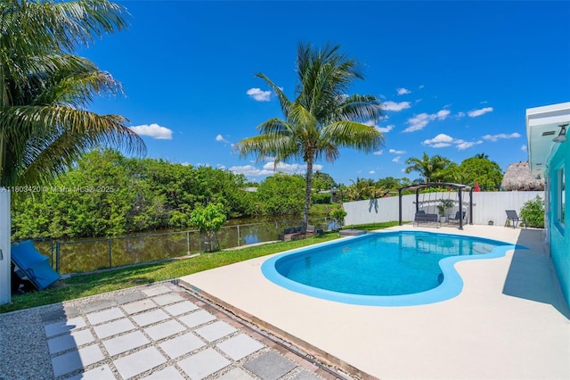 12351 NW 29th Mnr, Sunrise, FL 33323 - view of swimming pool with a patio area and a fenced backyard
