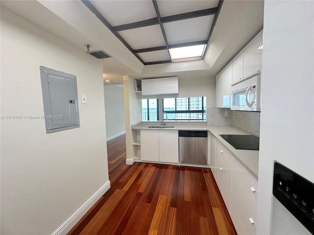 520 Brickell Key Dr Unit A811, Miami, FL 33131 - kitchen with white appliances, a sink, electric panel, dark wood-style flooring, and white cabinets