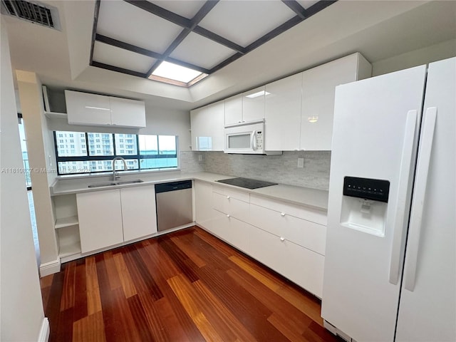 520 Brickell Key Dr Unit A811, Miami, FL 33131 - kitchen with white appliances, a sink, dark wood-type flooring, and white cabinetry