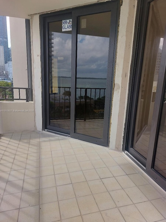 520 Brickell Key Dr Unit A811, Miami, FL 33131 - view of patio with a balcony