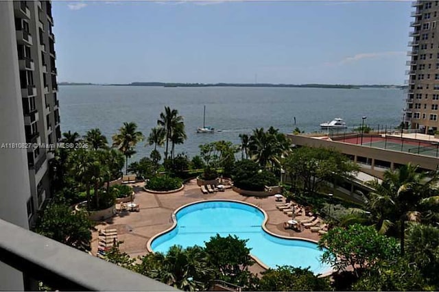 520 Brickell Key Dr Unit A811, Miami, FL 33131 - community pool with a water view and a patio area