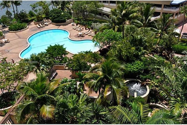520 Brickell Key Dr Unit A811, Miami, FL 33131 - community pool featuring a patio area