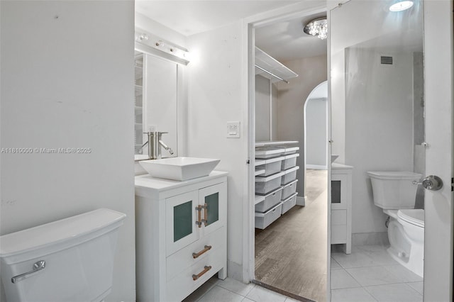 150 SE 25th Rd Unit 10K, Miami, FL 33129 - full bath featuring toilet, vanity, and tile patterned floors