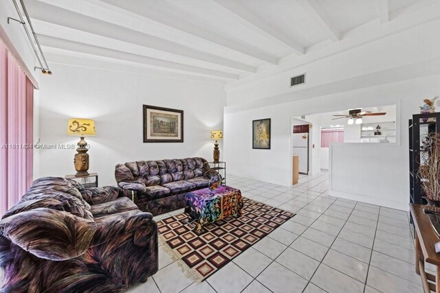 1090 SW 31st St, Fort Lauderdale, FL 33315 - living room with beam ceiling, a ceiling fan, and light tile patterned flooring