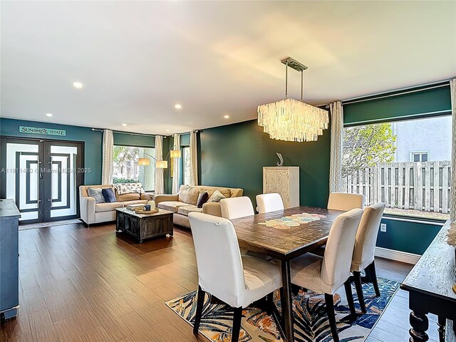 21241 SW 88th Pl, Cutler Bay, FL 33189 - dining space featuring a chandelier, dark wood-style flooring, recessed lighting, french doors, and baseboard heating