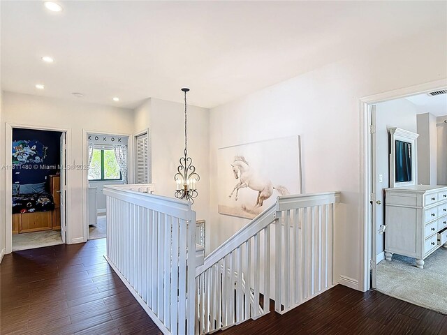 21241 SW 88th Pl, Cutler Bay, FL 33189 - hall featuring an upstairs landing, dark wood finished floors, recessed lighting, a chandelier, and baseboards