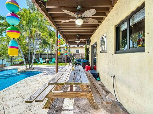 21241 SW 88th Pl, Cutler Bay, FL 33189 - fenced backyard featuring ceiling fan, outdoor dining area, and a patio area