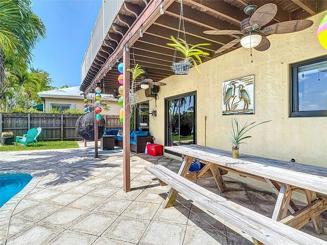 21241 SW 88th Pl, Cutler Bay, FL 33189 - view of patio / terrace with ceiling fan, an outdoor living space, and outdoor dining space