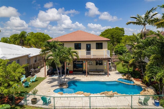 21241 SW 88th Pl, Cutler Bay, FL 33189 - view of swimming pool with a patio area