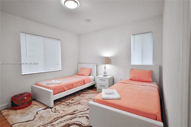1967 NW 65th St, Miami, FL 33147 - bedroom featuring wood finished floors and baseboards