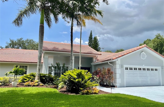 20390 NW 2nd St, Pembroke Pines, FL 33029 - mediterranean / spanish-style house with a tile roof, stucco siding, a garage, and concrete driveway
