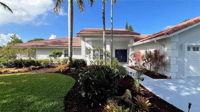 20390 NW 2nd St, Pembroke Pines, FL 33029 - mediterranean / spanish-style house with a tile roof and stucco siding