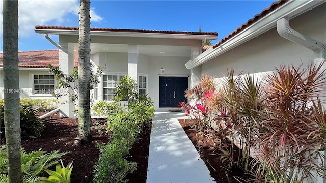20390 NW 2nd St, Pembroke Pines, FL 33029 - entrance to property featuring a tile roof and stucco siding