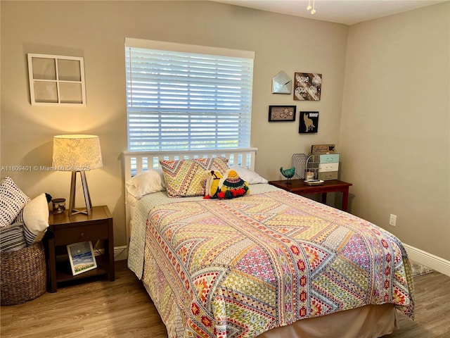 20390 NW 2nd St, Pembroke Pines, FL 33029 - bedroom featuring wood finished floors and baseboards