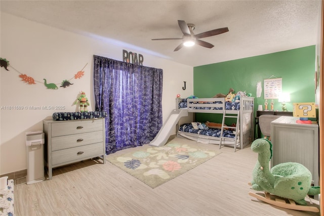 834 W 80th Pl, Hialeah, FL 33014 - bedroom featuring wood finished floors and a ceiling fan