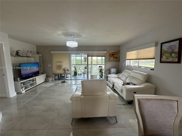 13700 SW 14th St Unit 412D, Pembroke Pines, FL 33027 - living area with a textured ceiling