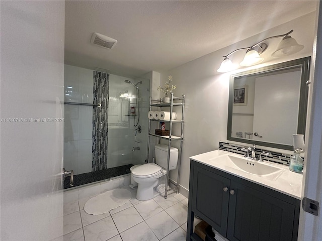 13700 SW 14th St Unit 412D, Pembroke Pines, FL 33027 - bathroom featuring a shower stall, vanity, and toilet
