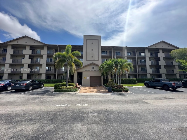 13700 SW 14th St Unit 412D, Pembroke Pines, FL 33027 - view of apartment building / complex with uncovered parking