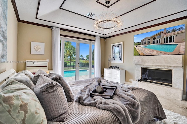 10427 Stonebridge Blvd, Boca Raton, FL 33498 - bedroom featuring access to outside, french doors, crown molding, a chandelier, and a high end fireplace