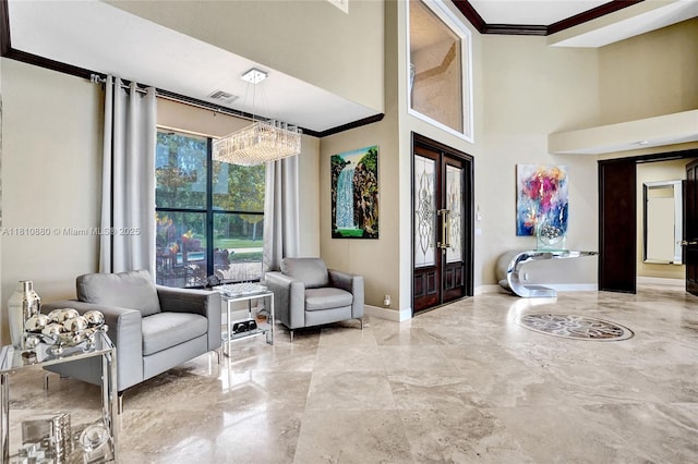 10427 Stonebridge Blvd, Boca Raton, FL 33498 - foyer featuring marble tiled floors, baseboards, a towering ceiling, crown molding, and a chandelier