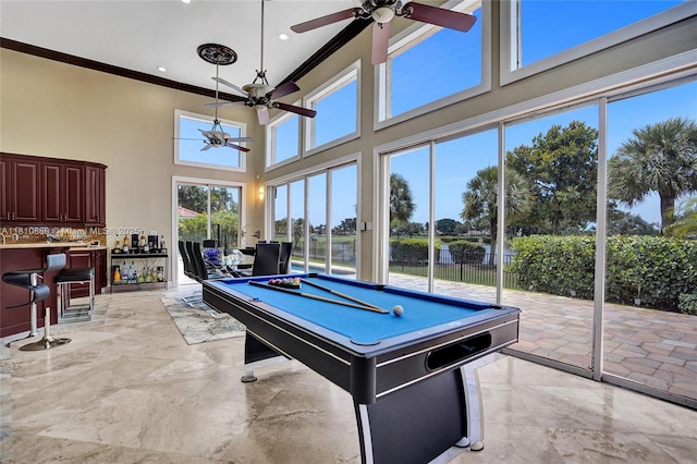 10427 Stonebridge Blvd, Boca Raton, FL 33498 - game room with ceiling fan, crown molding, billiards, a high ceiling, and light marble finish flooring