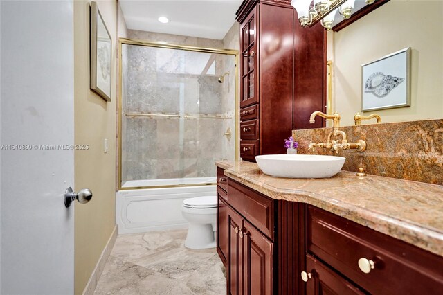 10427 Stonebridge Blvd, Boca Raton, FL 33498 - full bath with vanity, toilet, baseboards, shower / bath combination with glass door, and marble finish floors