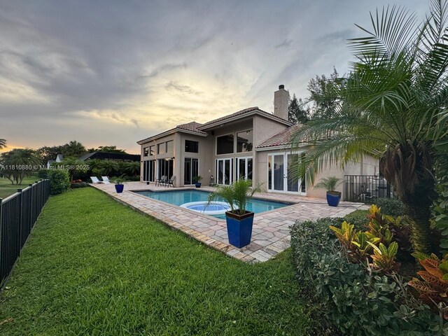 10427 Stonebridge Blvd, Boca Raton, FL 33498 - view of swimming pool with a patio