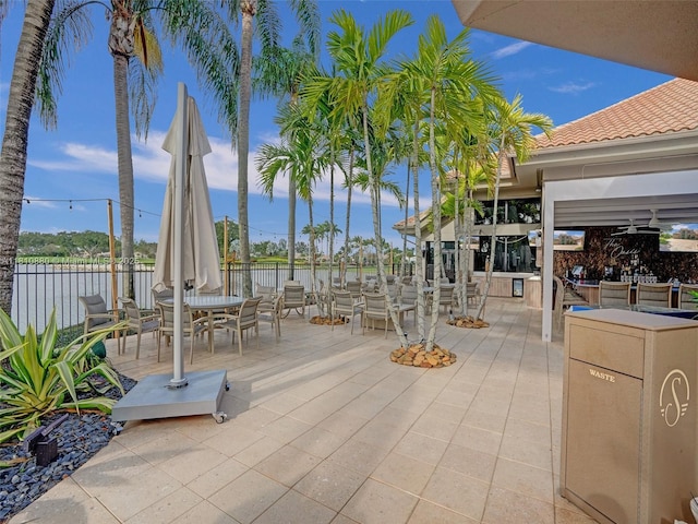 10427 Stonebridge Blvd, Boca Raton, FL 33498 - view of patio with outdoor dining space and a water view