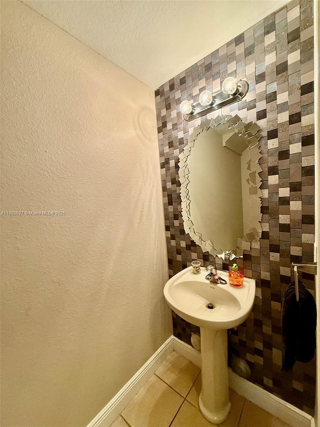 3721 NE 4th Unit 4Th, Homestead, FL 33033 - bathroom with tile patterned floors, baseboards, and a textured ceiling