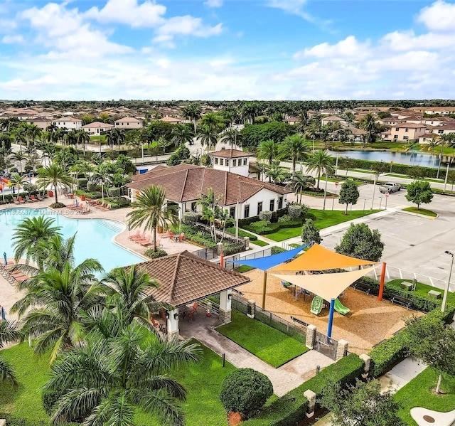 3721 NE 4th Unit 4Th, Homestead, FL 33033 - aerial perspective of suburban area with a nearby body of water and a pool area