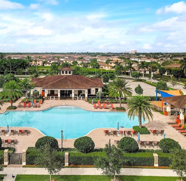 3721 NE 4th Unit 4Th, Homestead, FL 33033 - community pool with a patio and a residential view
