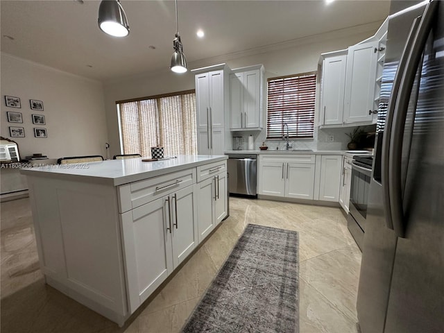 12464 SW 42nd St, Miramar, FL 33027 - kitchen with appliances with stainless steel finishes, a sink, a center island, light countertops, and crown molding