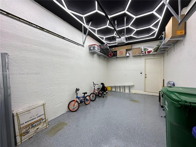 12464 SW 42nd St, Miramar, FL 33027 - garage featuring a textured wall and a garage door opener