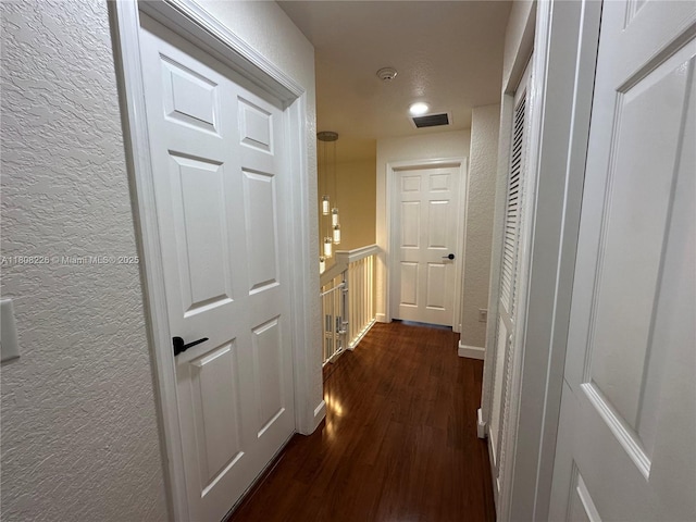 12464 SW 42nd St, Miramar, FL 33027 - corridor featuring dark wood-type flooring and a textured wall