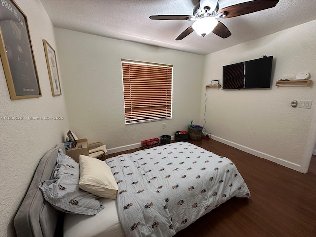 12464 SW 42nd St, Miramar, FL 33027 - bedroom featuring wood finished floors, baseboards, and ceiling fan