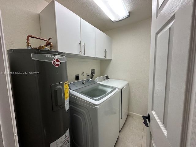 12464 SW 42nd St, Miramar, FL 33027 - laundry room featuring electric water heater, cabinet space, washing machine and clothes dryer, light tile patterned floors, and a textured wall