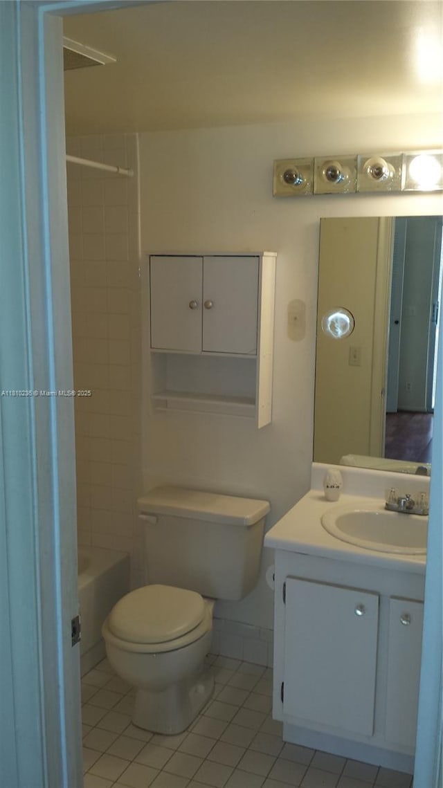 151 SW 134th Way Unit 206N, Pembroke Pines, FL 33027 - bathroom featuring tile patterned flooring, vanity, toilet, and shower / washtub combination