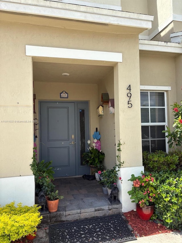 495 NE 5th Way, Florida City, FL 33034 - entrance to property with stucco siding