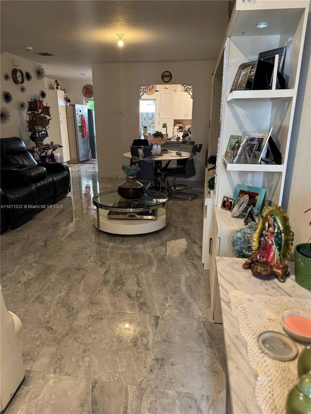 495 NE 5th Way, Florida City, FL 33034 - living area featuring a textured ceiling