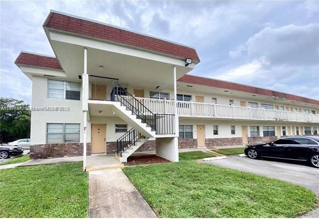 6211 SW 37th St Unit 211, Davie, FL 33314 - view of building exterior featuring stairs