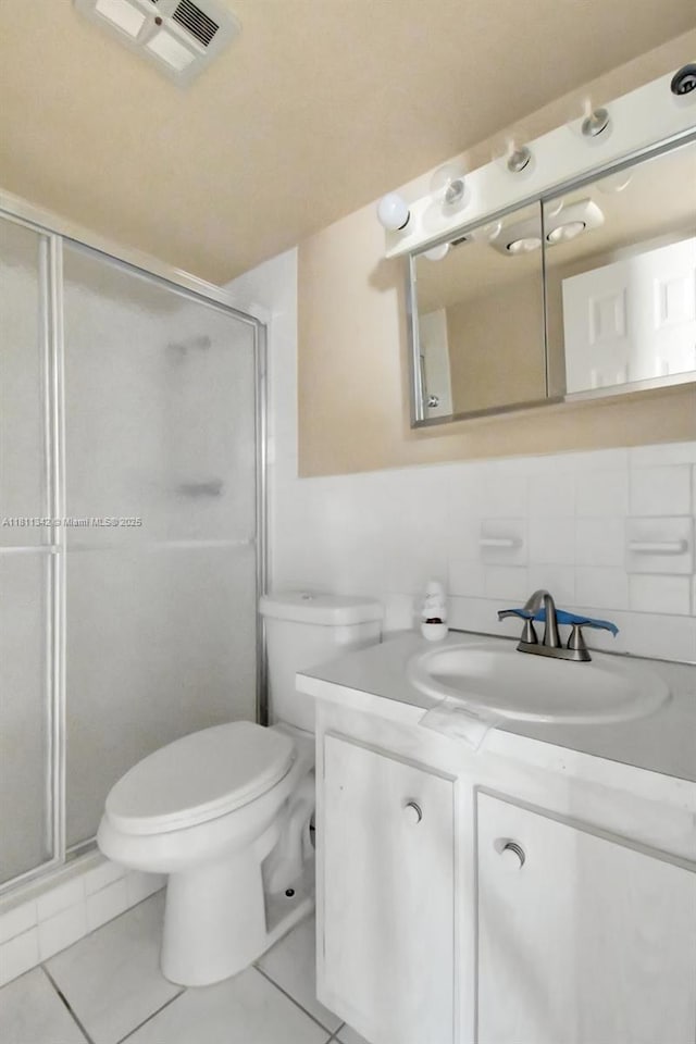 6211 SW 37th St Unit 211, Davie, FL 33314 - bathroom featuring vanity, toilet, a shower stall, and tile patterned flooring