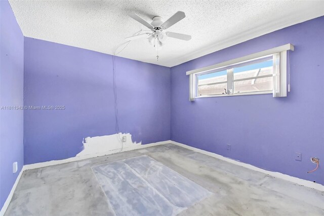 6211 SW 37th St Unit 211, Davie, FL 33314 - spare room with ceiling fan, baseboards, and a textured ceiling
