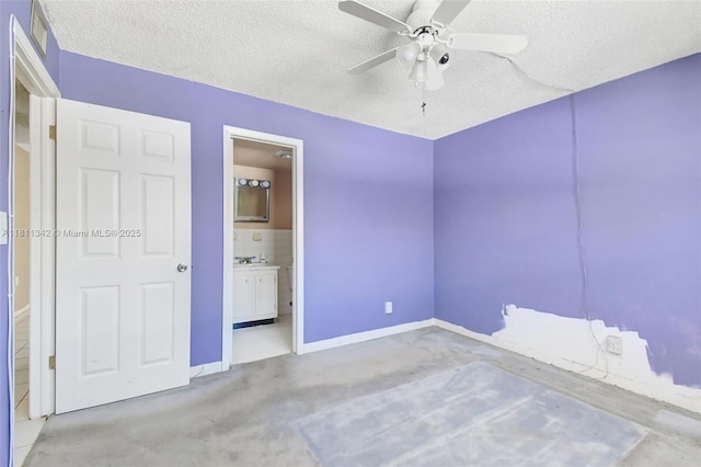 6211 SW 37th St Unit 211, Davie, FL 33314 - unfurnished bedroom featuring a textured ceiling, ensuite bath, ceiling fan, and baseboards