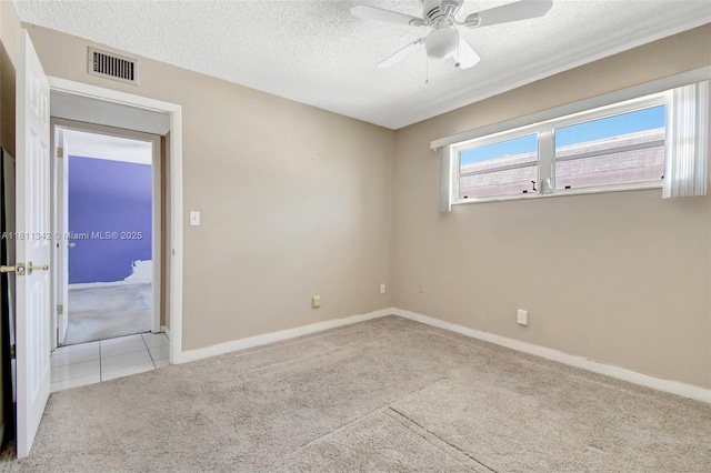 6211 SW 37th St Unit 211, Davie, FL 33314 - carpeted empty room with ceiling fan, a textured ceiling, baseboards, and tile patterned floors