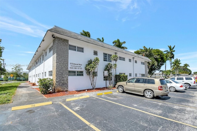 6211 SW 37th St Unit 211, Davie, FL 33314 - view of property featuring uncovered parking