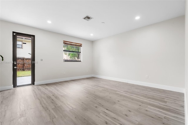 24083 SW 112th Pl, Homestead, FL 33032 - spare room with light wood-style flooring and recessed lighting