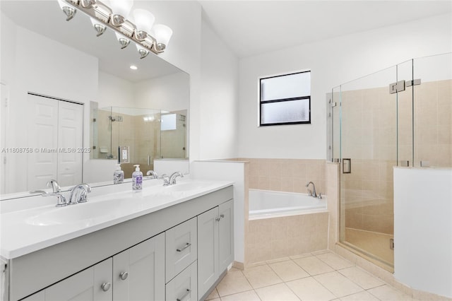 24083 SW 112th Pl, Homestead, FL 33032 - full bath featuring double vanity, a shower stall, tile patterned floors, and a garden tub