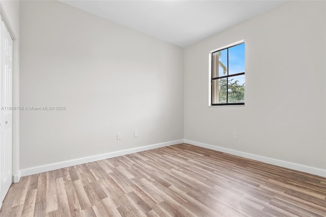 24083 SW 112th Pl, Homestead, FL 33032 - empty room featuring light wood-style floors and baseboards