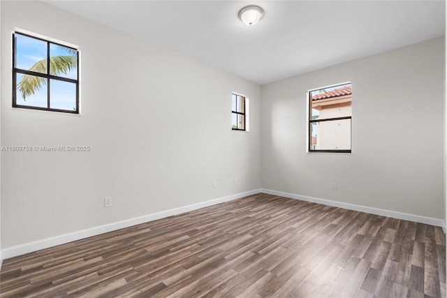 24083 SW 112th Pl, Homestead, FL 33032 - unfurnished room with wood finished floors and baseboards