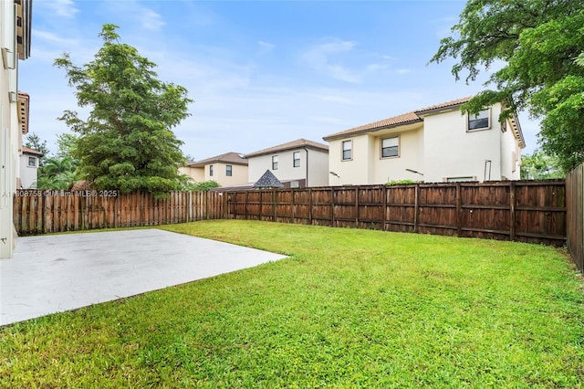 24083 SW 112th Pl, Homestead, FL 33032 - fenced backyard featuring a patio area